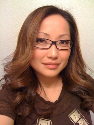 Lighter hair, natural makeup and glasses (11/09)