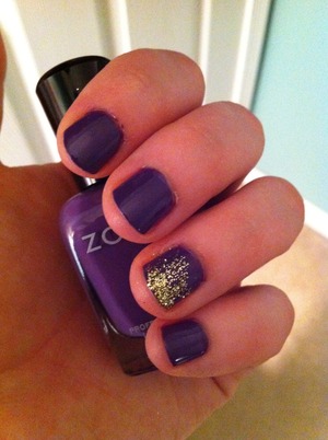 Purple and gold glitter nails. :)