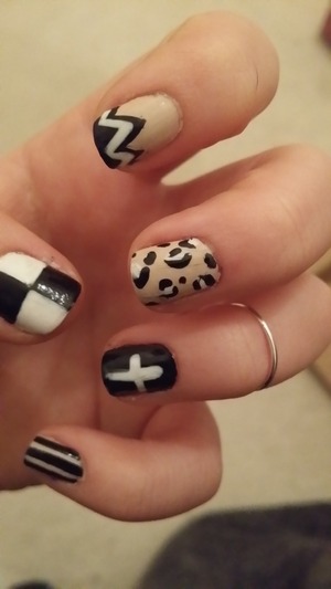 Neutral leopard print with done geometric designs to maintain some edge to the simple coloring