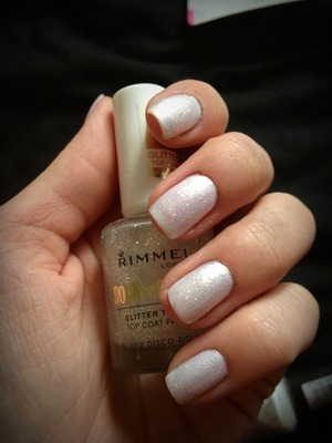 White nail polish with a glittery top coat - Love these colours together ! 