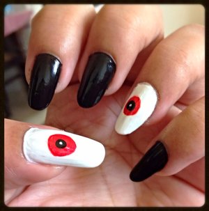 See the tutorial @ https://www.youtube.com/watch?v=_1--g9uaOj4
For more Pics visit http://www.gorgeousnailschannel.com/2013/10/easy-last-minute-halloween-nails.html

Follow me on :- 
YouTube : https://www.youtube.com/user/SuperGorgeousnails 
Blog : http://www.gorgeousnailschannel.com 
Facebook : https://www.facebook.com/SuperGorgeousNails 
Twitter : https://twitter.com/DemiNails123 
Pinterest: http://www.pinterest.com/deminails123/