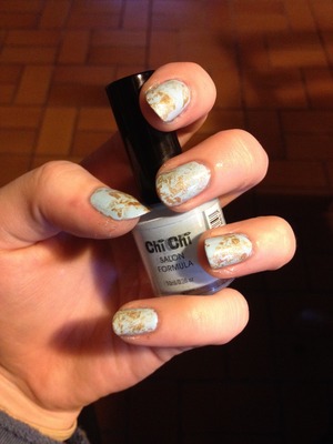 My first attempt at the Robin's Egg inspired manicure. I used Chi Chi Gimme Gimme A Man and N.Y.C Gold Coin.