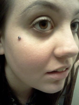 Dermal piercing online on face