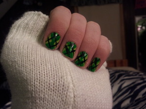 These are my green and black argyle nails. I got the idea from cutepolish. I did use stripers for this look.