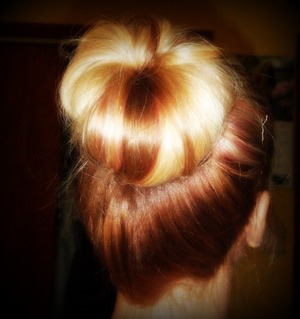 Finally got the sock bun down! So excited!! :)...Used: Goody elastic, bobby pins, Kenra Finishing Hairspray and an old sock.