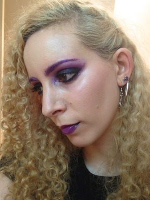 I craved a dark look and wanted to use M.A.C Mineralize Young punk again. So I also decided to incorporate my favourite dark purple Sugarpill's Poison plum and some purple glitter brows using Inglot matte eyeliner #73 and Eye Kandy Sour grape sprinkles!

http://michtymaxx.blogspot.com.au/2013/01/plum-punk.html