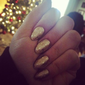 Gold pointed nails :)