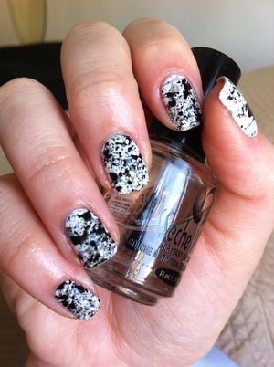 # 7 - black and white nails

splattered
=)