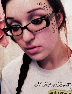 Super thick, and elongated cateye! +Badass cheetah print along side the face. Top that off with nude lips!