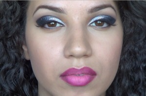 Inspired by the current trends of Monochrome and Neon I created this look, incorporating glitter and a cut crease into the eyes, and ombre into the lips.
I have a video tutorial for this look.