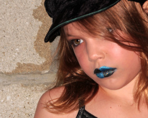  Black and Blue lip look easy to do and for the stark lines use regualar everyday tape 