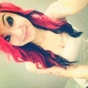 Top red, bottom black!(: with some curls. 