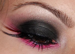 black smokey eye with a touch of pink