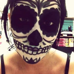 Halloween sugar skill makeup. White face makeup pack and cover girl eyeliner. 