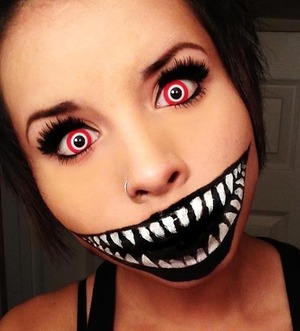 I used 5$ face paint to achieve this look & I just bought the contacts from local store. :)