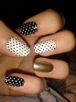 White and Black simple polka dots with a touch of gold on the accent finger :)