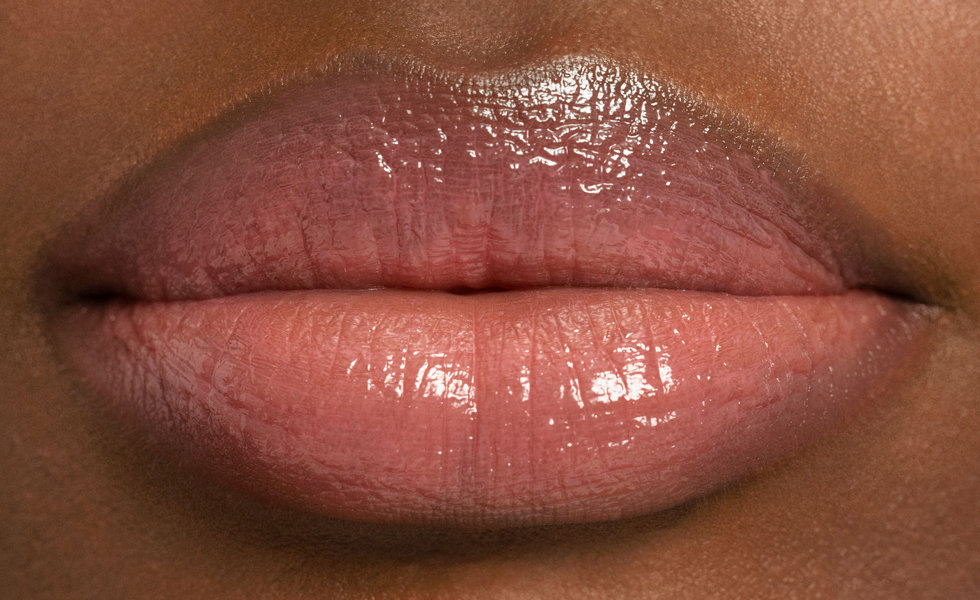 Model wearing Chantecaille Lip Sheer in Swallowtail