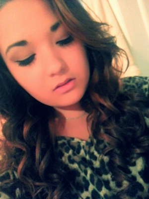 Curly hair and wing eyeliner. 