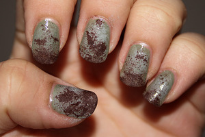 Muddy nails design made using sponging technique.

http://iloveprettycolours.blogspot.com/2011/12/31-day-challenge-day-twenty-four.html