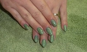 green glitter nail art for christmas