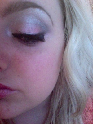 Neutral shimmery eye makeup.