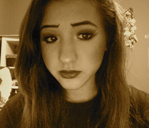 Edgy dark look with stern looking scouse brow 