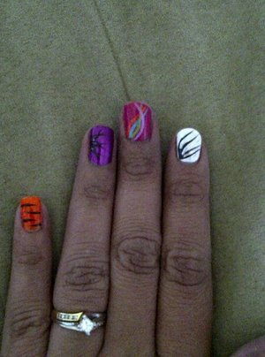 this on i just did different designs on each finger just to show some of my free hand nail art  