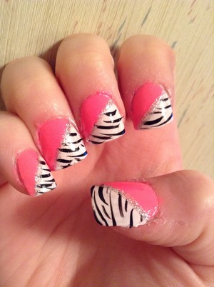 These zebra and pink striped nails are soo cute And easy.  