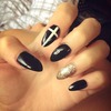 Fresh black and gold stilletto nails!!