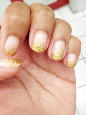 Gold glitter tips.... Decided to try something different for a change. I usually only like full-on color!