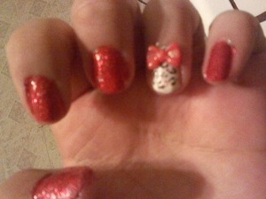 red glitter nails with white nail cheetah print and red bow <3
