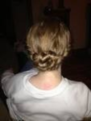It is two side braid stwisted up into a bun