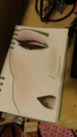 Keeping the colors on the page with no base was extremely hard...I'm surprised it came out as good as it did. I added pops of green in the inner eye and brows because it's my favorite color.