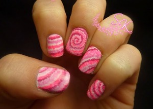 http://sparkylienails.blogspot.com/2013/05/tie-dye-effect-nail-art-freestyle.html