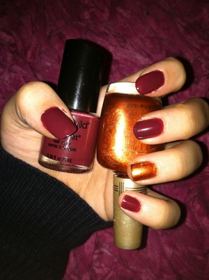 This is a simple nail color with an accent of Gold on my ring finger