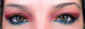 Cut Crease! Using the Maybelline's Color Tattoo as a base (Bold Gold, Fierce & Tangy, Pomegranate Punk and Tenacious Teal). Eyeshadow Colors used: MAC Bright Fushia (pigment), Orange, Chrome Yellow, Electric Eel and Shimmermoss. Note: I am growing my eyeb