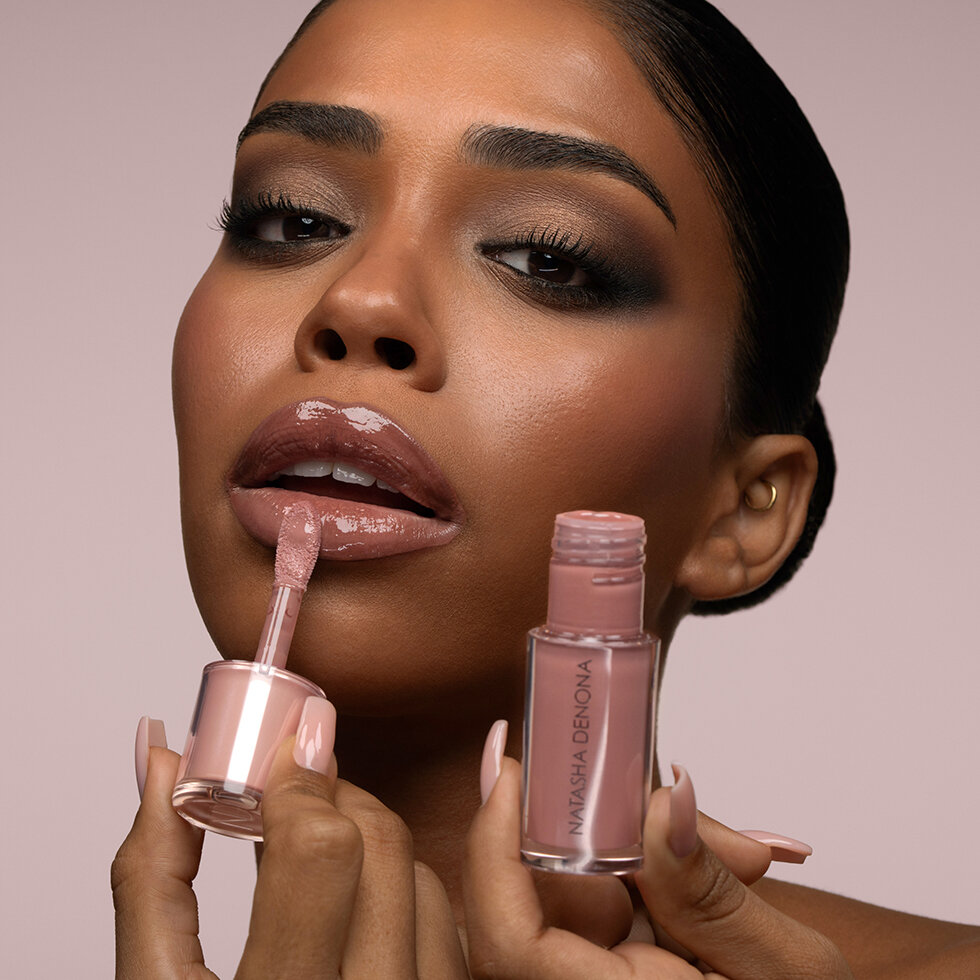 Model using Natasha Denona HY-GLOSS Milky Tinted Lip Balm
