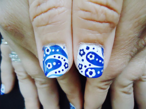 i gave my mom a decorated mani ^^ again- i got this look from IndigoNova1- she's so talented. here's the link: http://www.youtube.com/watch?v=F0rFm787nY8&feature=channel_video_title