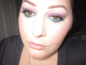 This look is GREAT for hot summer days! Especially with the neon trends! It's fun, bright and easy to do. Just sweep a purple shadow across your lid, then find your most electric teal shadow and swipe it on your bottom lash line. Apply a matching liner to your water line (top and bottom) add copious amounts of mascara, a neutral blush and gloss and you're good to go! I personally would wear this look day OR night :)