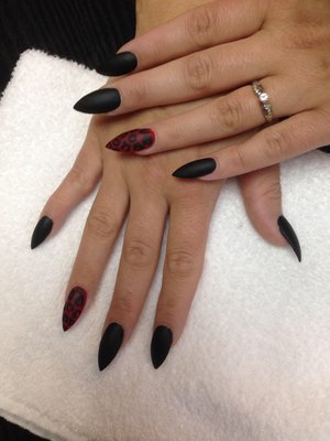 Stiletto nails, black n red, using Opi matte top coat to create the matte looks 