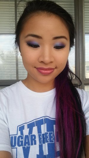 I was going for a mermaid, sea-inspired look with this one. Using a light blue shade on the lid and a purple shade on the outer "V"