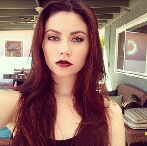 Pale Skin, dark lips, dark hair and colored eyes... What could match better?