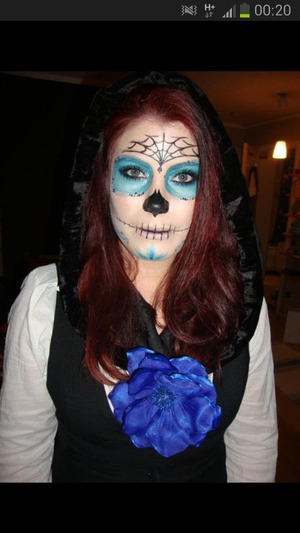 Went as a "candy scull" last halloween. Using different eyeliners and a few blings