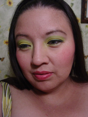 It looks a lot like cilantro julep but the yellow is more intense and the green is more of a chartruse rather than the minty green I used in Cilantro julep.. and instead of a black eye liner i used UD 24/7 liquid eyeliner in siren ( a turquoise color)