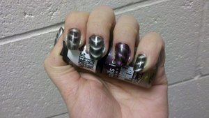gunmetal on all nails except for the ring, purple  