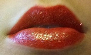 Lips I wore for the 4th :)) It looks kinda pinkish orange in the pic but in reality it was bright red :))