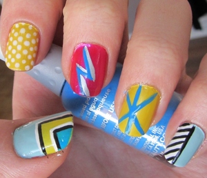 Check out the NOTD at http://rivuletsbeauty.blogspot.ca/2012/03/notd-kapow-graphic-inspired-nails.html
(: