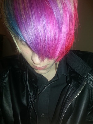 my rainbow hair ;) i used crazy color semi permanent hair dye in bubblegum blue , pinkissmo , fire ,and hot purple ( mixed with some pinkissmo) 