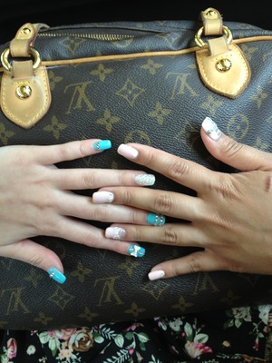 Mines the Tiffany blue hers is the pink! If you live in Toronto and live in Markham go to luv'in nails! 