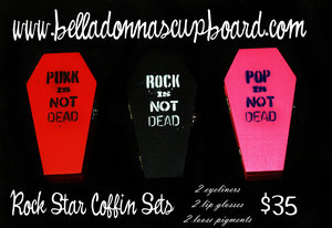 Rockstar Coffin Sets, designed with stage wear in mind. Full of long lasting and bright colors. Each coffin set comes with 2 pigments, 2 lip glosses and 2 eyeliners, each 5 gram size. $35 (it would cost $44 just to buy all the individual colors on their own)
www.belladonnascupboard.com
https://twitter.com/BellaDCupboard
http://instagram.com/belladonnascupboard
https://www.tumblr.com/blog/belladonnascupboard

Coffin Boxes painted by Shannon Gregory